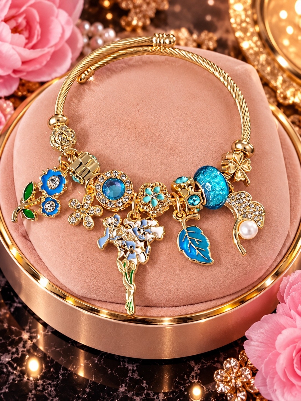 Gold Charm Bracelet with Blue Enamel Accents
